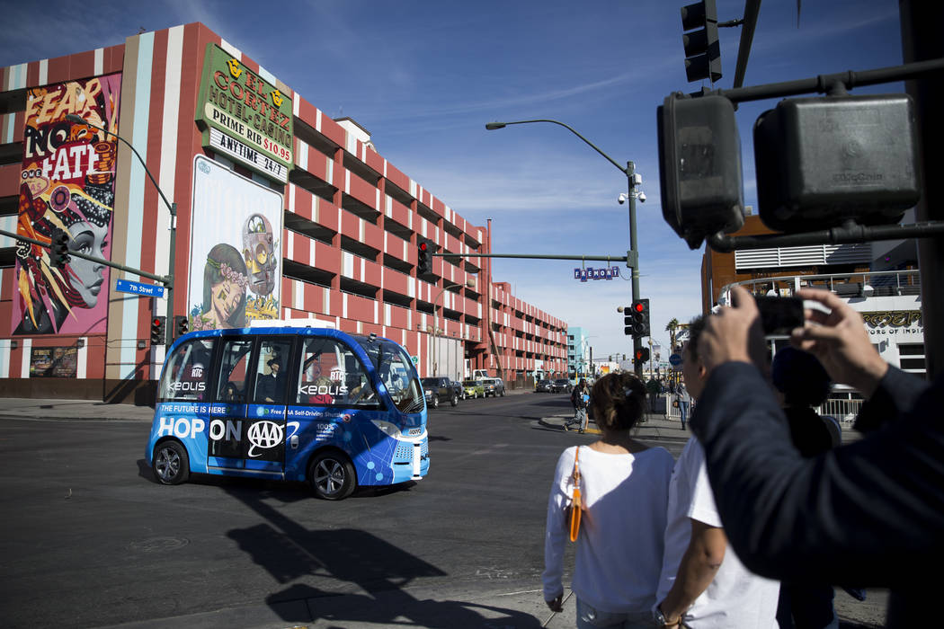 A driverless electric shuttle tours passengers downtown following a launch event at the Container Park in Las Vegas, Wednesday, Nov. 8, 2017. Erik Verduzco Las Vegas Review-Journal @Erik_Verduzco