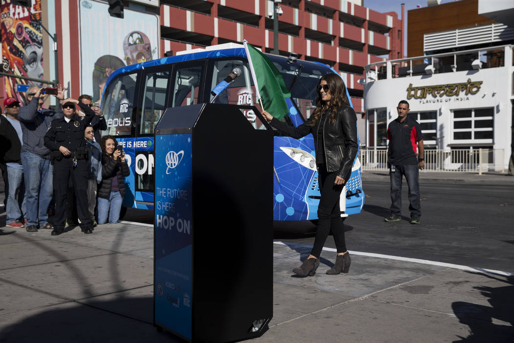 NASCAR driver Danica Patrick waves the green flag during a launch event of a driverless electric shuttle at the Container Park in Las Vegas, Wednesday, Nov. 8, 2017. Erik Verduzco Las Vegas Review ...