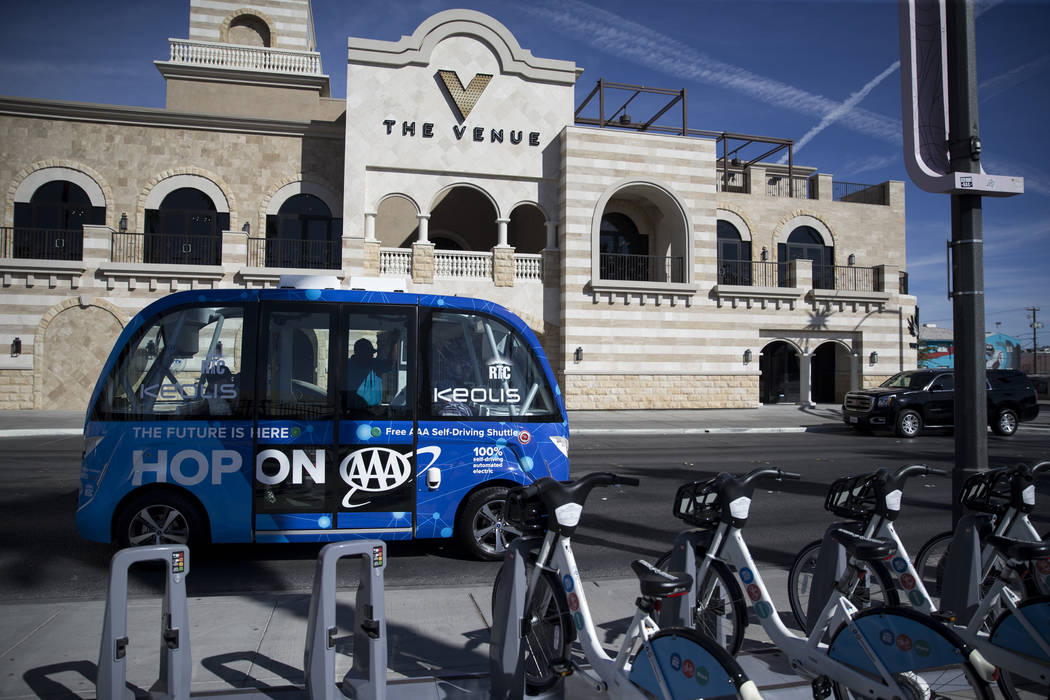 A driverless electric shuttle tours passengers downtown following a launch event at the Container Park in Las Vegas, Wednesday, Nov. 8, 2017. Erik Verduzco Las Vegas Review-Journal @Erik_Verduzco