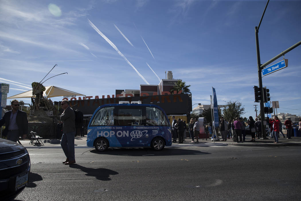 A driverless electric shuttle tours passengers downtown following a launch event at the Container Park in Las Vegas, Wednesday, Nov. 8, 2017. Erik Verduzco Las Vegas Review-Journal @Erik_Verduzco