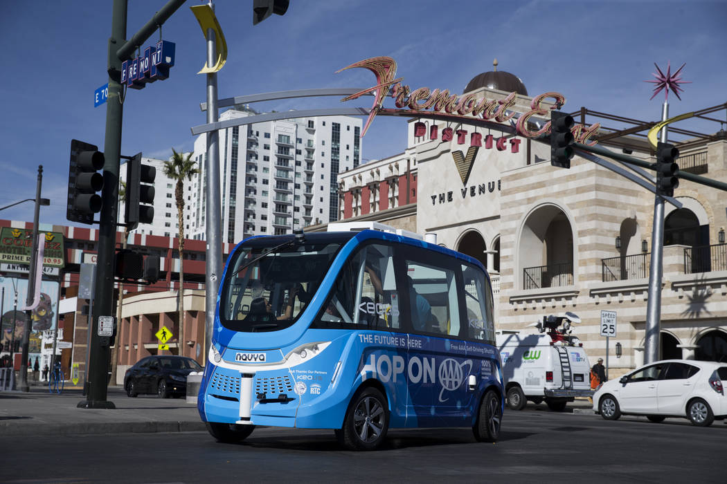 A driverless electric shuttle tours passengers downtown following a launch event at the Container Park in Las Vegas, Wednesday, Nov. 8, 2017. Erik Verduzco Las Vegas Review-Journal @Erik_Verduzco