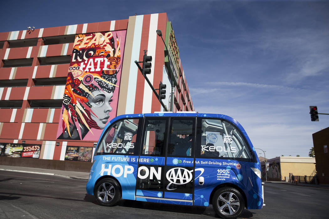 A driverless electric shuttle tours passengers downtown following a launch event at the Container Park in Las Vegas, Wednesday, Nov. 8, 2017. Erik Verduzco Las Vegas Review-Journal @Erik_Verduzco