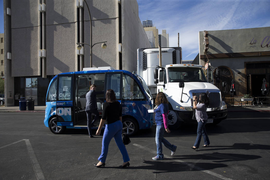 The scene of an accident between a truck and a driverless electric shuttle near Fremont Street and S. 6th Street in Las Vegas during the launch day of the autonomous vehicle, Wednesday, Nov. 8, 20 ...