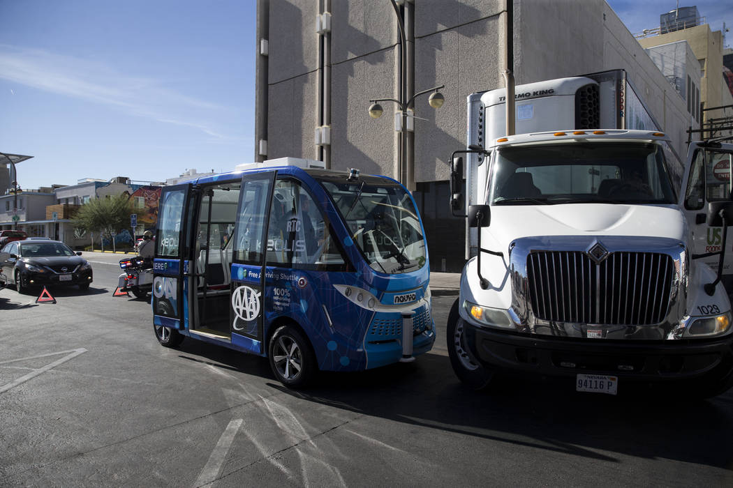 The scene of an accident between a truck and a driverless electric shuttle near Fremont Street and S. 6th Street in Las Vegas during the launch day of the autonomous vehicle, Wednesday, Nov. 8, 20 ...
