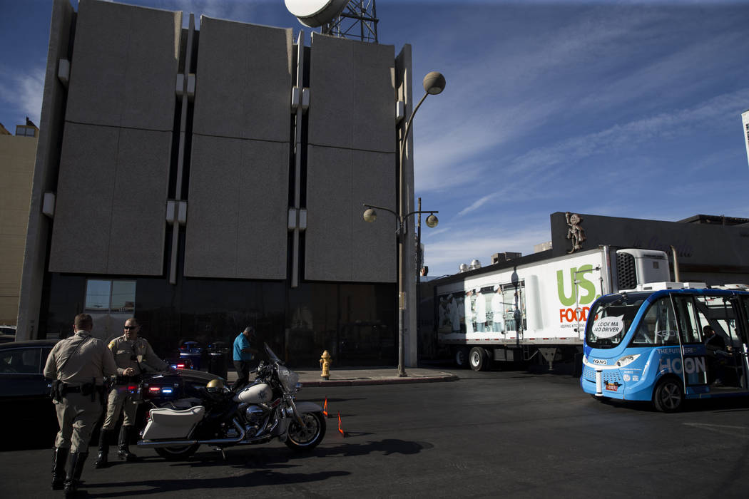 The scene of an accident between a truck and a driverless electric shuttle near Fremont Street and S. 6th Street in Las Vegas during the launch day of the autonomous vehicle, Wednesday, Nov. 8, 20 ...