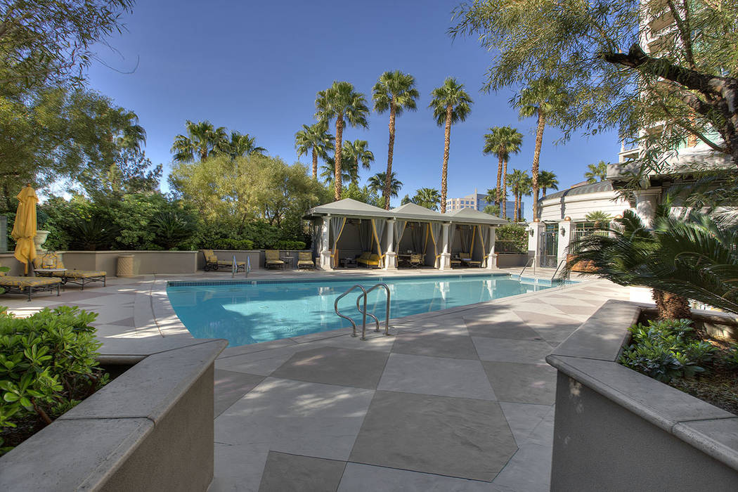 The pool area is near the garden. (Synergy|Sotheby’s International Realty)