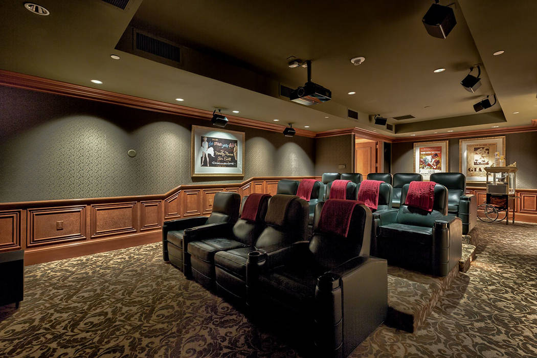 The common area also has a stocked theater. (Synergy|Sotheby’s International Realty)