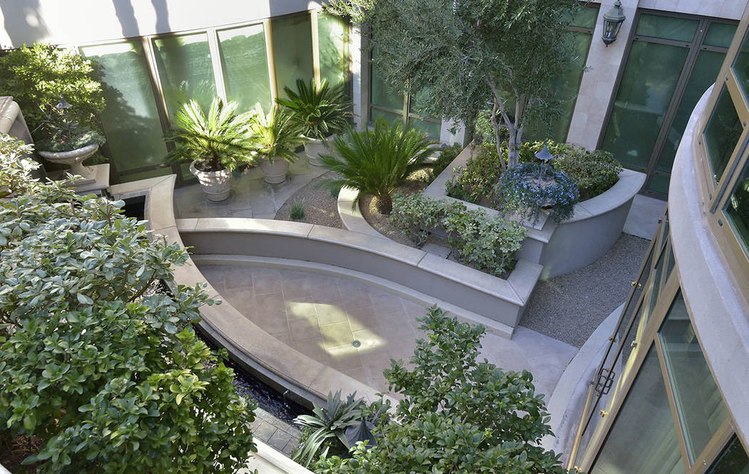Bill Hughes Real Estate Millions 
The home opens to Park Towers' garden.