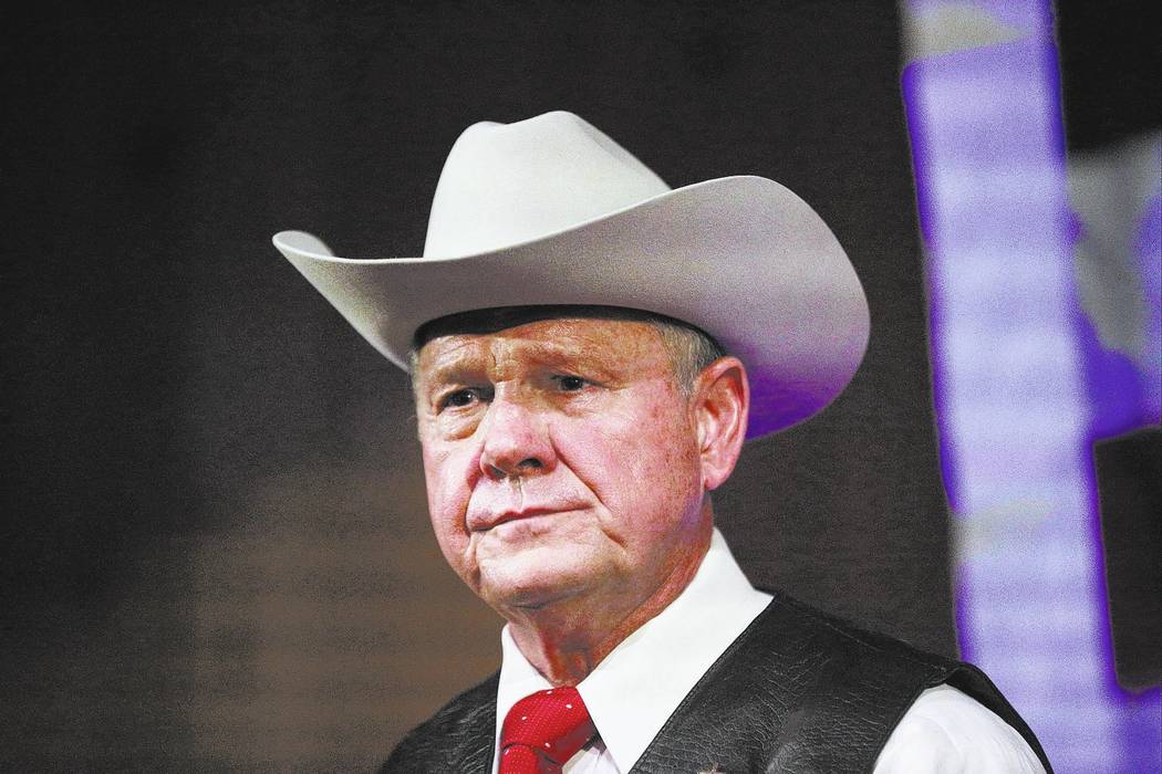 Roy Moore speaks at a rally. (AP Photo/Brynn Anderson, File)