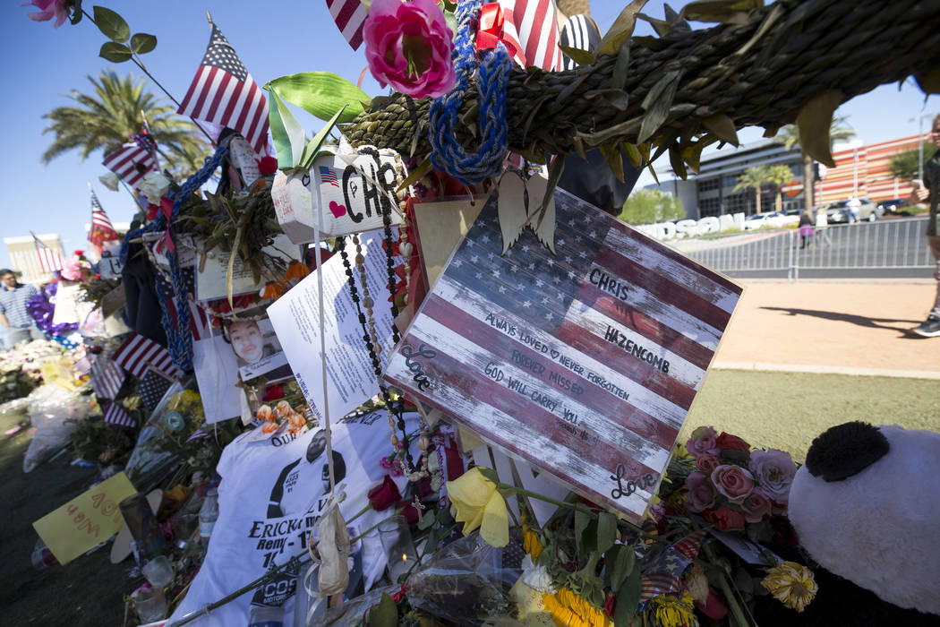 The cross of Chris Hazencomb, 44, of Camarillo, California at a memorial for Route 91 Harvest shooting victims at the Welcome to Fabulous Las Vegas sign, Sunday, Oct. 15, 2017. Richard Brian Las V ...