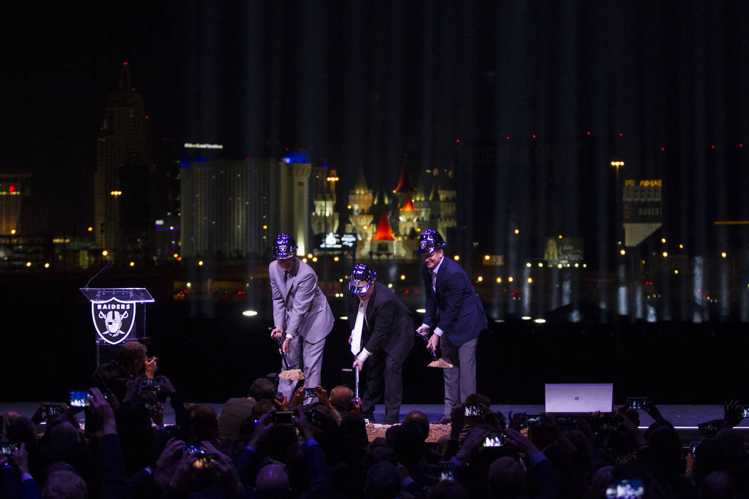 Gov. Brian Sandoval, from left, Raiders owner Mark Davis, and NFL Commissioner Roger Goodell during the Raiders stadium groundbreaking ceremony in Las Vegas, Monday, Nov. 13, 2017. Erik Verduzco L ...