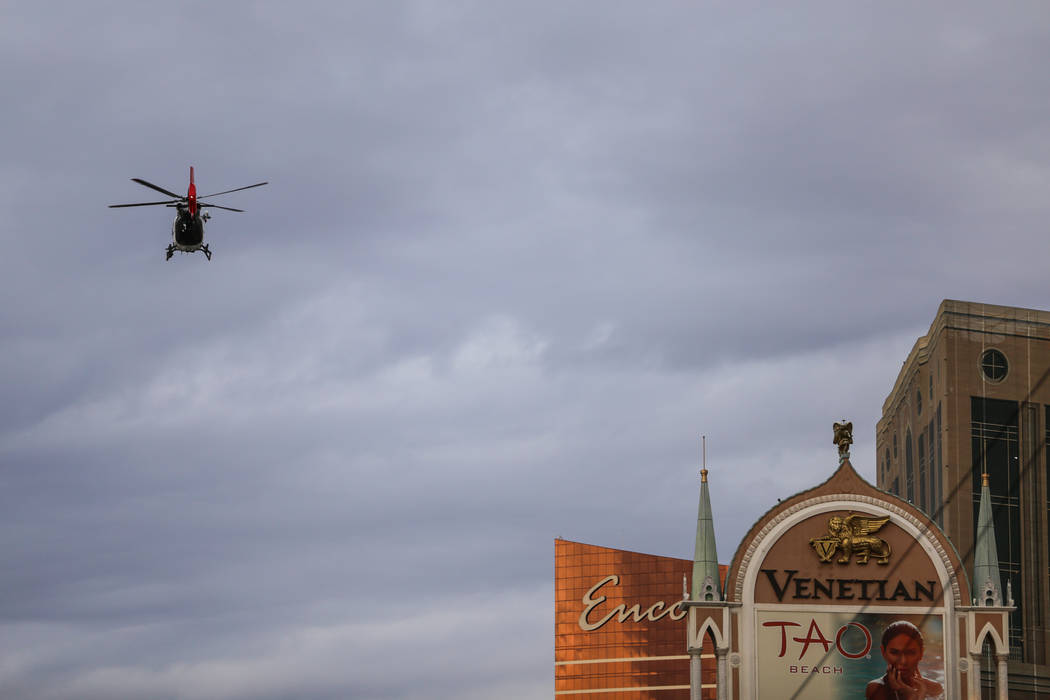 A police chopper flies above the Rock 'n' Roll Las Vegas Marathon course along the Strip near The Mirage in Las Vegas, Sunday, Nov. 12, 2017. Joel Angel Juarez Las Vegas Review-Journal @jajuarezphoto