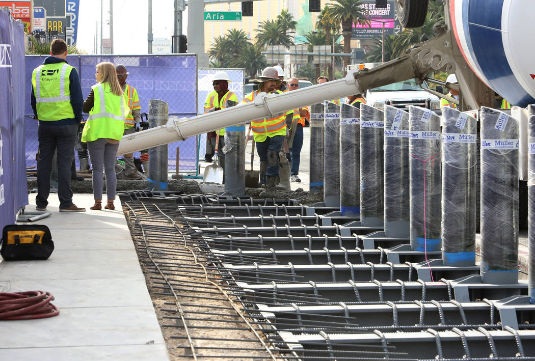 Construction crews began installing steel posts on the Strip near Aria on Monday, Nov. 13, 2017, to protect pedestrians along Las Vegas Boulevard. (Bizuayehu Tesfaye/Las Vegas Review-Journal) @biz ...