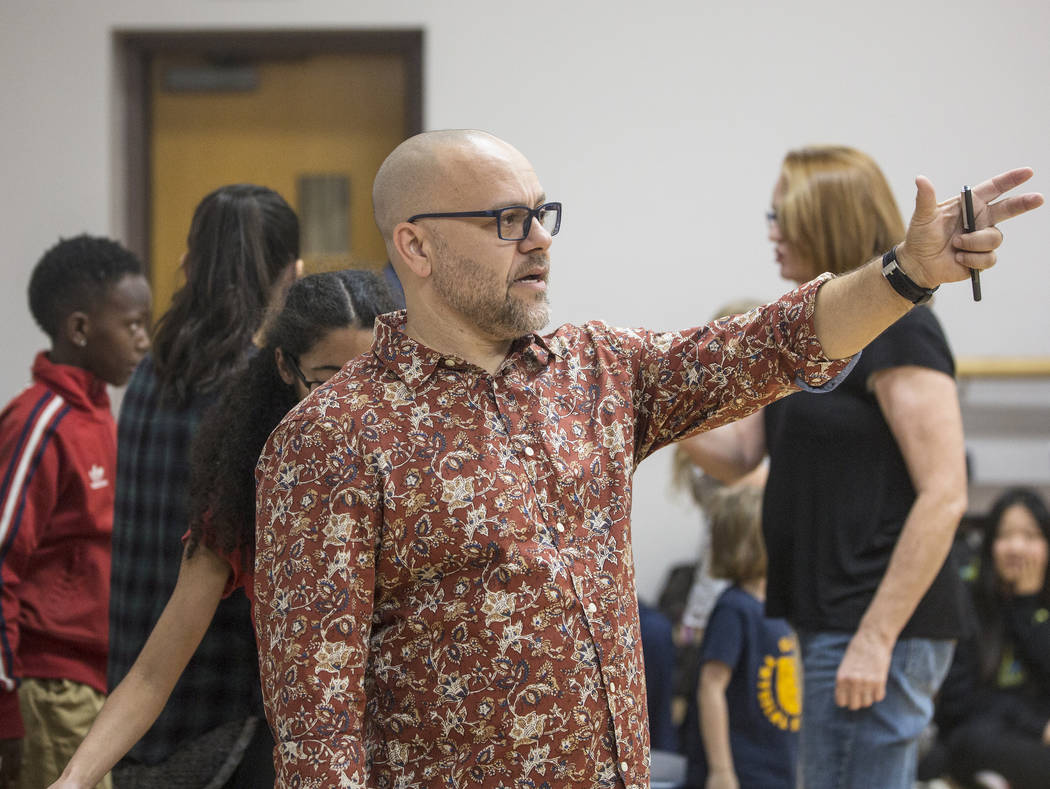 Director Christopher Edwards leads rehearsal of the Nevada Conservatory Theatre's "A Christmas Carol," offering a contemporary twist on the original Charles Dickens' Victorian-era tale on Tuesday, ...