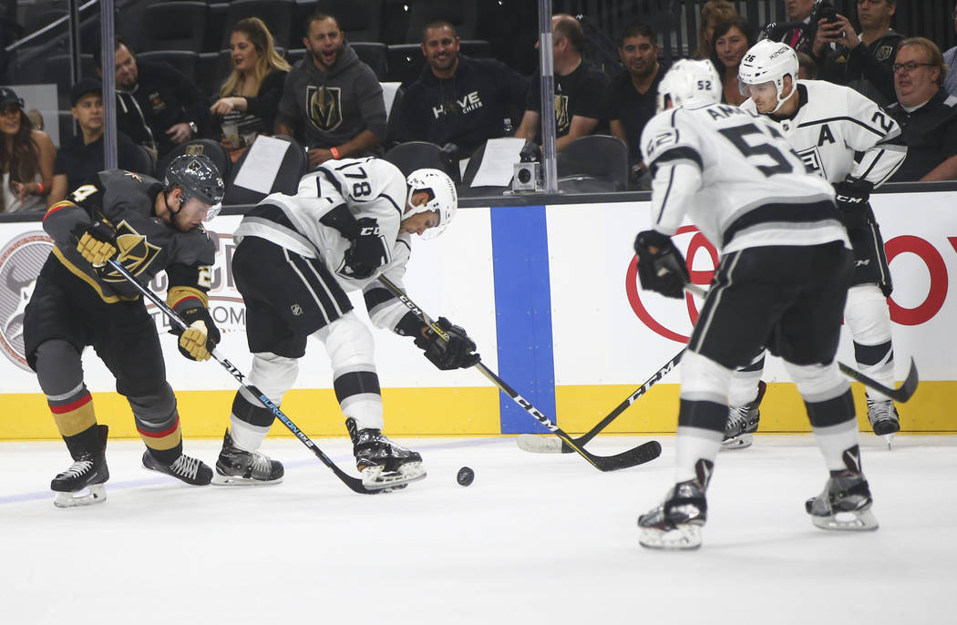 Golden Knights' Oscar Lindberg (24) fights for the puck against Los Angeles Kings' Alex Iafallo (78) during an NHL preseason hockey game at T-Mobile Arena in Las Vegas on Tuesday, Sept. 26, 2017.  ...