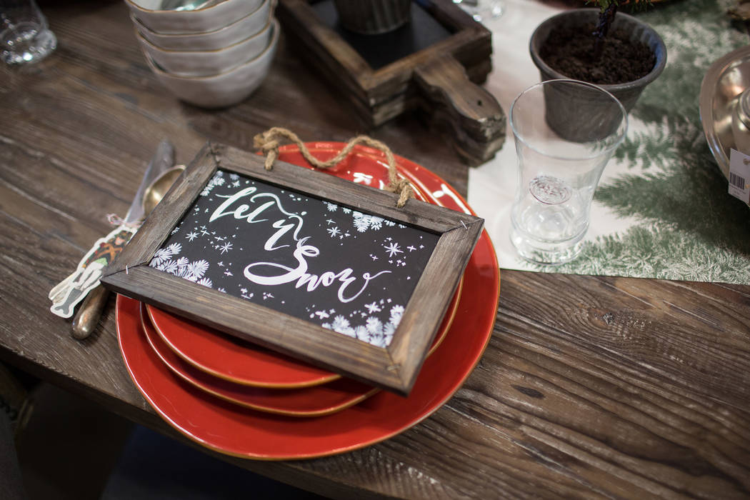 Skyros Designs
Go rustic with a heavy wood table and nonornamental, poppy red dishware. The chalkboard picture frame can be used for the menu.
