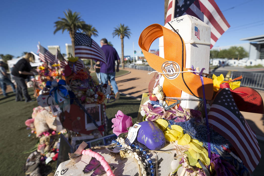 The crosses and mementos left behind by visitors at a memorial for Route 91 Harvest shooting victims at the Welcome to Fabulous Las Vegas sign, Thursday, Nov. 9, 2017. Richard Brian Las Vegas Revi ...