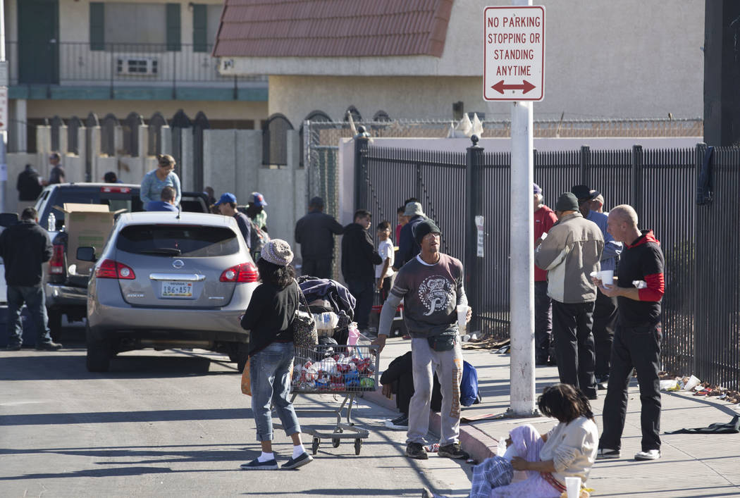 Homeless people gather on Foremaster Lane between Las Vegas Boulevard and Main Street in Las Vegas, Wednesday, Nov. 22, 2017. Richard Brian Las Vegas Review-Journal @vegasphotograph
