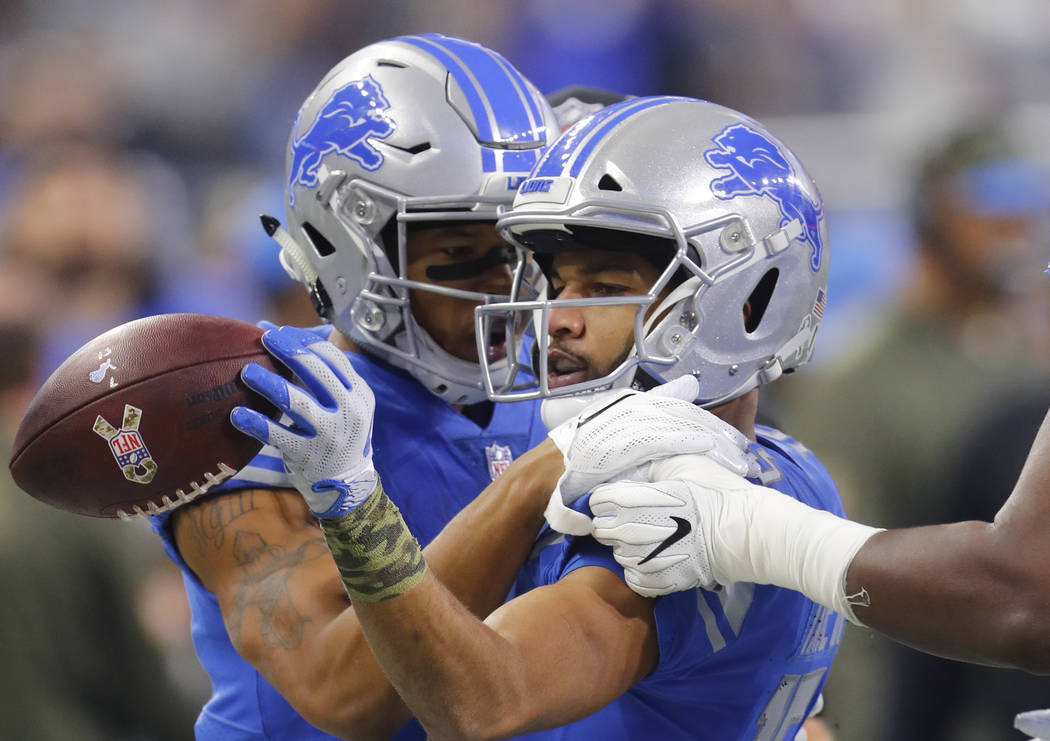 Detroit Lions wide receiver Golden Tate, right, celebrates a first down with Marvin Jones (11) against the Cleveland Browns during an NFL football game in Detroit, Sunday, Nov. 12, 2017. (AP Photo ...