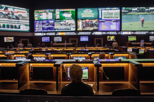 A man watches sports at the Green Valley Ranch race and sports book. (Las Vegas Review-Journal)
