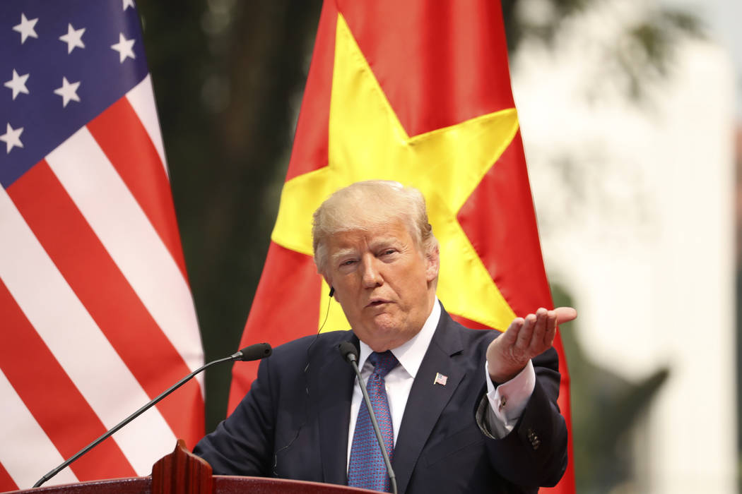President Donald Trump speaks during a news conference at the Presidential Palace, Sunday, Nov. 12, 2017, in Hanoi, Vietnam. Trump is on a five country trip through Asia traveling to Japan, South  ...