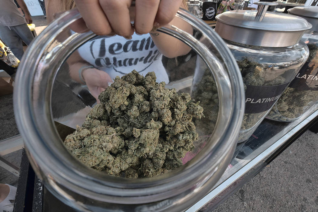 An assortment of marijuana strains is seen during the High Times Harvest Cup in San Bernardino, Calif. (AP Photo/Richard Vogel, file)
