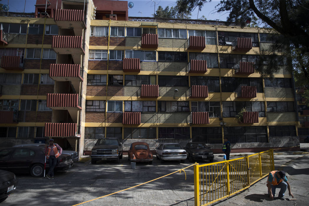 The uninhabited apartment complex, Unidad Habitacional de Tlalpan, which suffered structural damage during the Sept. 19 earthquake in Mexico City, Mexico, Friday, Nov. 17, 2017. An adjacent buildi ...