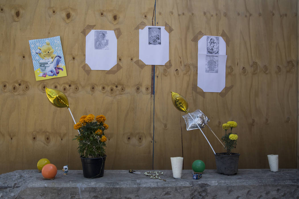 A memorial for the victims who died in the Colegio Enrique Rebsamen elementary school, which collapsed during the Sept. 19 earthquake in Mexico City, Mexico, Friday, Nov. 17, 2017. Nineteen childr ...