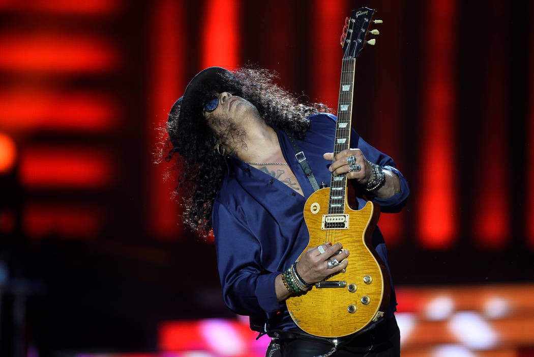 Slash, lead guitarist of U.S. rock band Guns N' Roses, performs on the first date of the European leg of the "Not in This Lifetime... Tour", at the San Mames football stadium in Bilbao, northern S ...