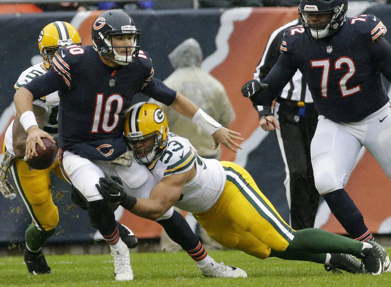 Nov 12, 2017; Chicago, IL, USA;  Chicago Bears quarterback Mitchell Trubisky (10) is sacked by Green Bay Packers outside linebacker Nick Perry (53) during the first quarter  at Soldier Field. Mand ...