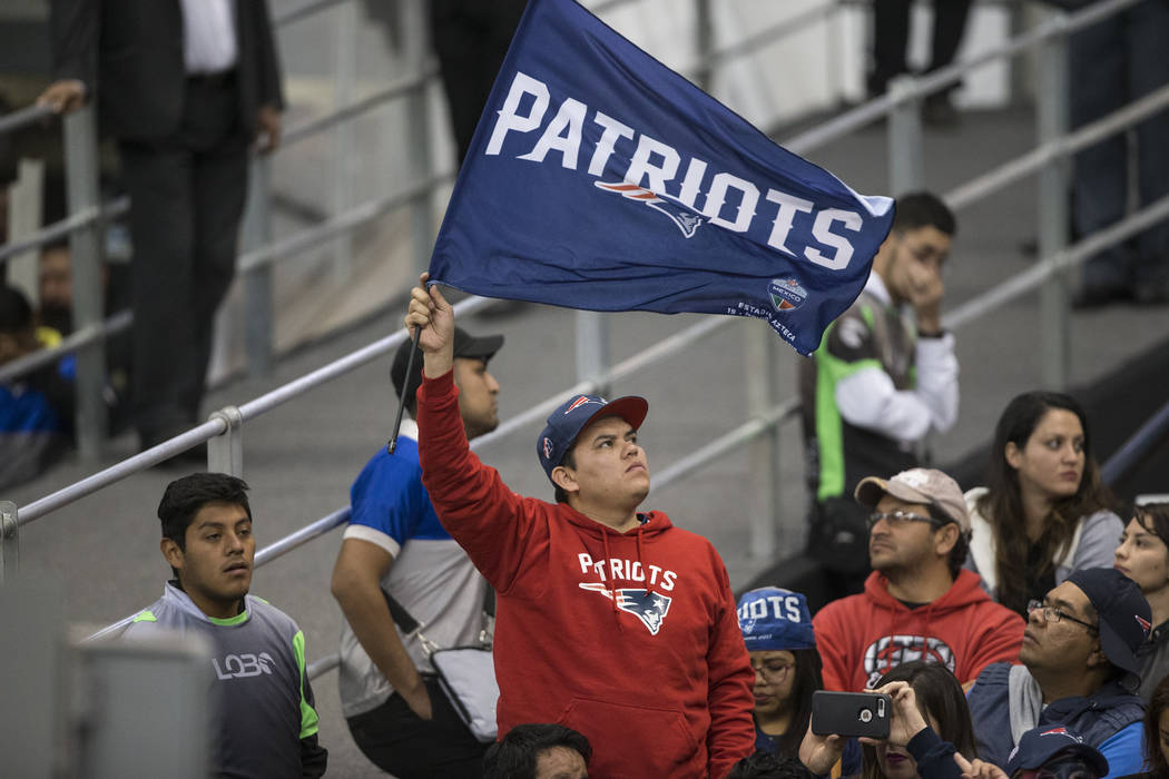 A fan during the NFL football game between the Oakland Raiders and New England Patriots at Estadio Azteca in Mexico City, Sunday, Nov. 19, 2017. New England Patriots won 33-8. Erik Verduzco Las Ve ...