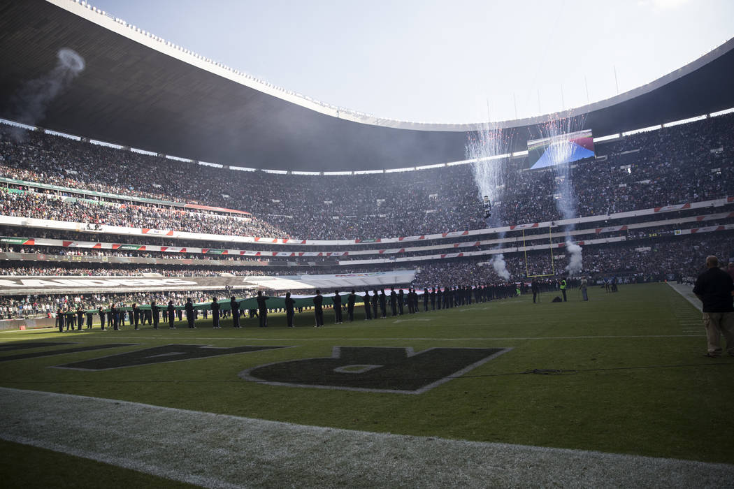 Fireworks go off before the NFL game between the Oakland Raiders and New England Patriots at Estadio Azteca in Mexico City, Sunday, Nov. 19, 2017. Erik Verduzco Las Vegas Review-Journal @Erik_Verduzco