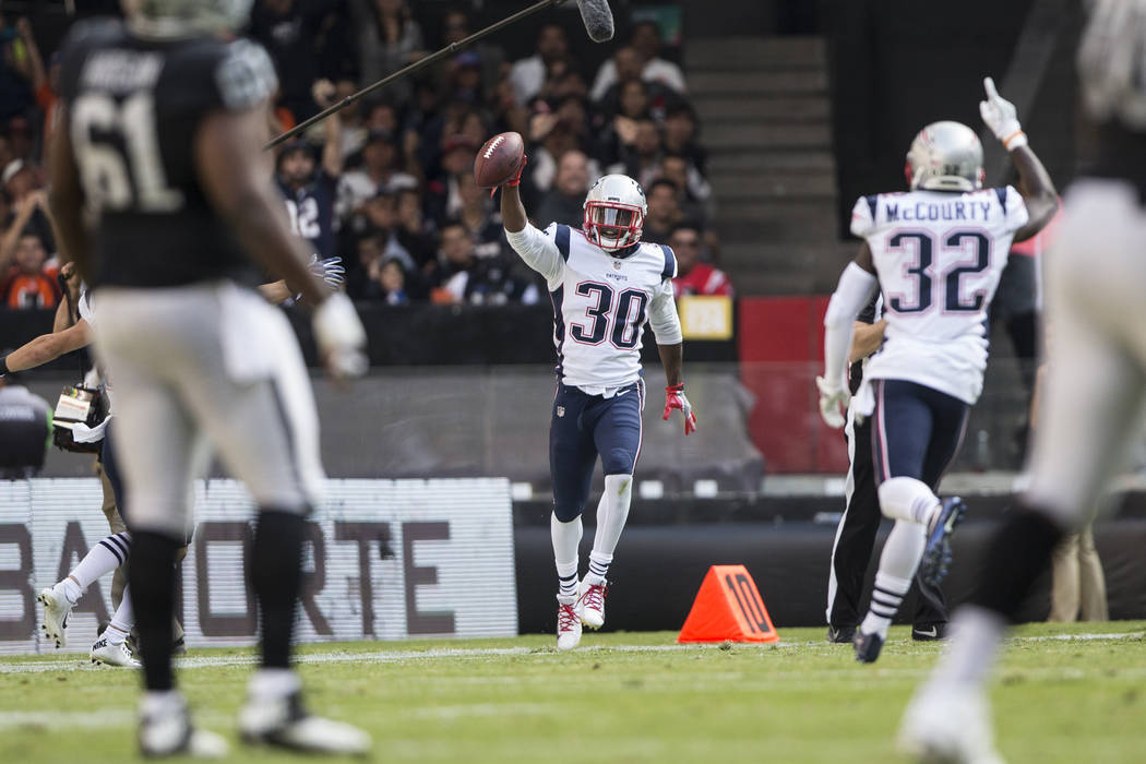 New England Patriots strong safety Duron Harmon (30) after an interception against the Oakland Raiders at Estadio Azteca in Mexico City, Sunday, Nov. 19, 2017. New England Patriots won 33-8. Erik  ...