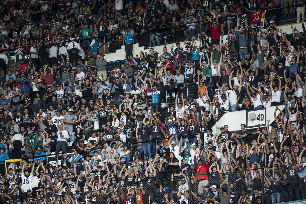 Fans do the wave during the NFL game between the Oakland Raiders and New England Patriots at Estadio Azteca in Mexico City, Sunday, Nov. 19, 2017. New England Patriots won 33-8. Erik Verduzco Las  ...