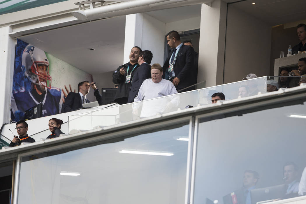 Oakland Raiders owner Mark Davis walks to his seat for the NFL game between the Oakland Raiders and New England Patriots at Estadio Azteca in Mexico City, Sunday, Nov. 19, 2017. New England Patrio ...