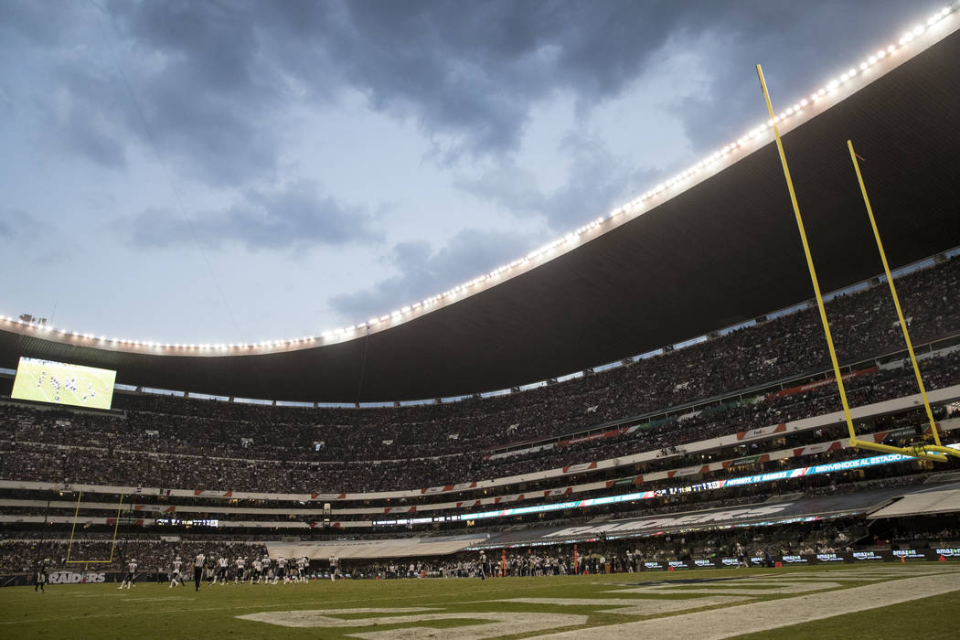 Fans watch the NFL game between the Oakland Raiders and New England Patriots at Estadio Azteca in Mexico City, Sunday, Nov. 19, 2017. New England Patriots won 33-8. Erik Verduzco Las Vegas Review- ...