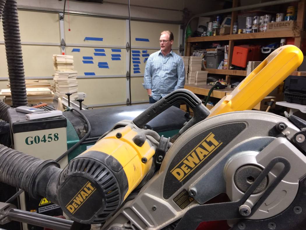 A miter saw is seen in the foreground as Ken Beck talks Nov. 13, 2017, about his effort to help locals stranded the night of the mass shooting. After transporting people to their homes, he said, h ...