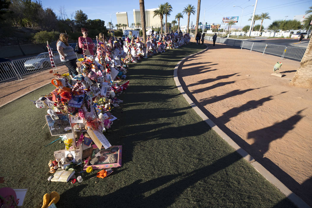 The crosses and mementos left behind by visitors at a memorial for Route 91 Harvest shooting victims at the Welcome to Fabulous Las Vegas sign, Thursday, Nov. 9, 2017. Richard Brian Las Vegas Revi ...