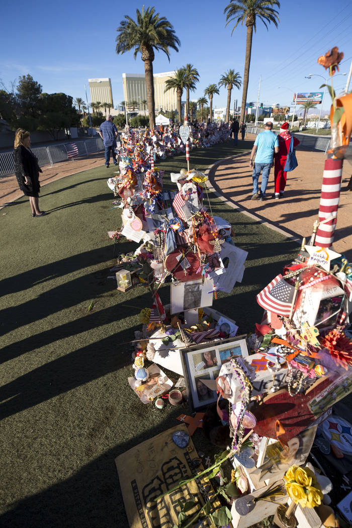 The crosses and mementos left behind by visitors at a memorial for Route 91 Harvest shooting victims at the Welcome to Fabulous Las Vegas sign, Thursday, Nov. 9, 2017. Richard Brian Las Vegas Revi ...