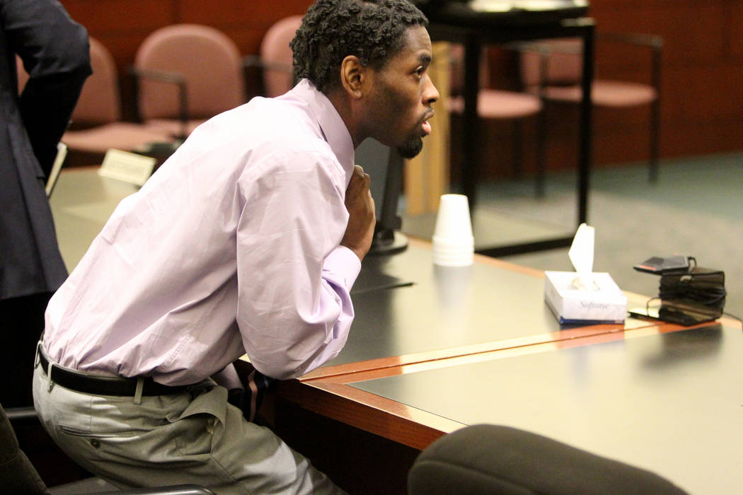 Bryan Clay stands and prepares to remove his tie after being found guilty at the Regional Justi ...