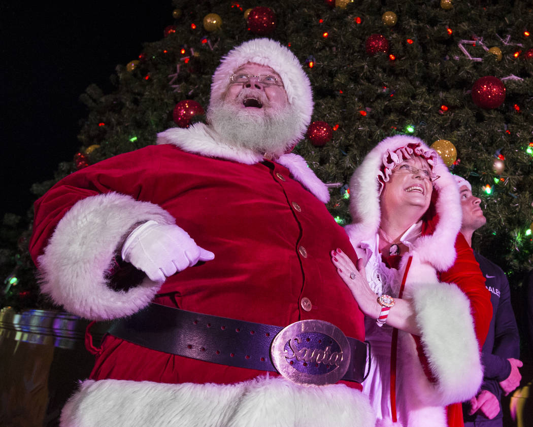 Santa and Mrs. Claus enjoy the fireworks at Opportunity Village's Magical Forest on Friday, Nov. 24, 2017, in Las Vegas. Benjamin Hager Las Vegas Review-Journal @benjaminhphoto