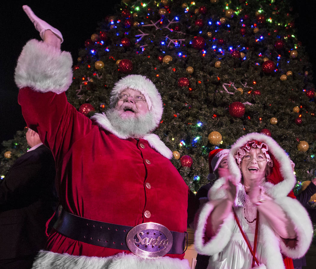 Santa and Mrs. Claus enjoy the fireworks at Opportunity Village's Magical Forest on Friday, Nov. 24, 2017, in Las Vegas. Benjamin Hager Las Vegas Review-Journal @benjaminhphoto