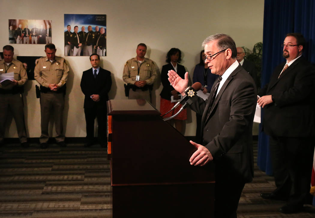 James &quot;Chip&quot; Coldren, managing director for justice programs in CNA Corporation's safety and security division, speaks during a press conference at the Las Vegas Metropolitan Pol ...