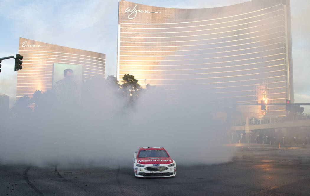 Race car driver Ryan Blaney (21) burns out on the Vegas Strip during NASCAR's Victory Lap on Wednesday, Nov. 29, 2017. Richard Brian Las Vegas Review-Journal @vegasphotograph