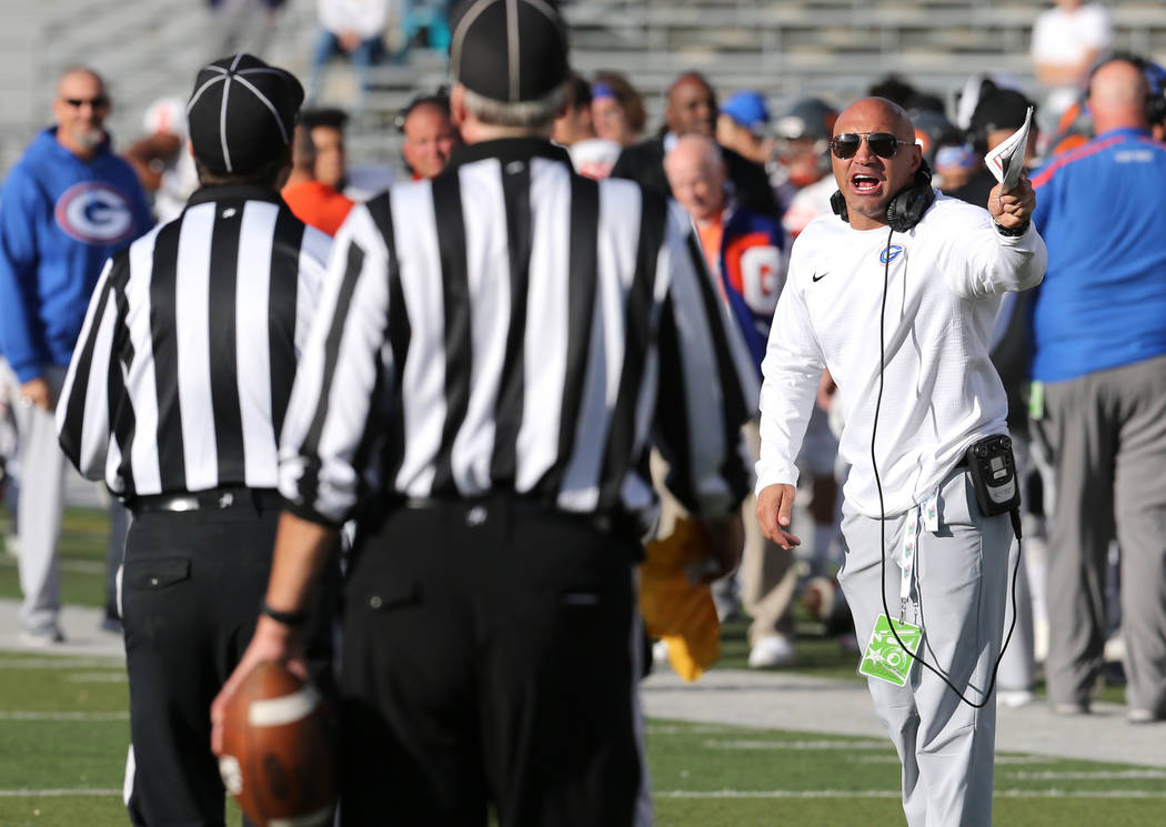 Bishop Gorman head coach Kenny Sanchez draws an unsportsmanlike penalty after yelling at the referees in the NIAA 4A state championship football game in Reno, Nev., on Saturday, Dec. 2, 2017. Gorm ...