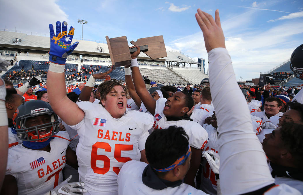 Bishop Gorman celebrates their 48-7 victory over Reed for the NIAA 4A state championship in Reno, Nev., on Saturday, Dec. 2, 2017. Cathleen Allison/Las Vegas Review Journal @NVMomentum