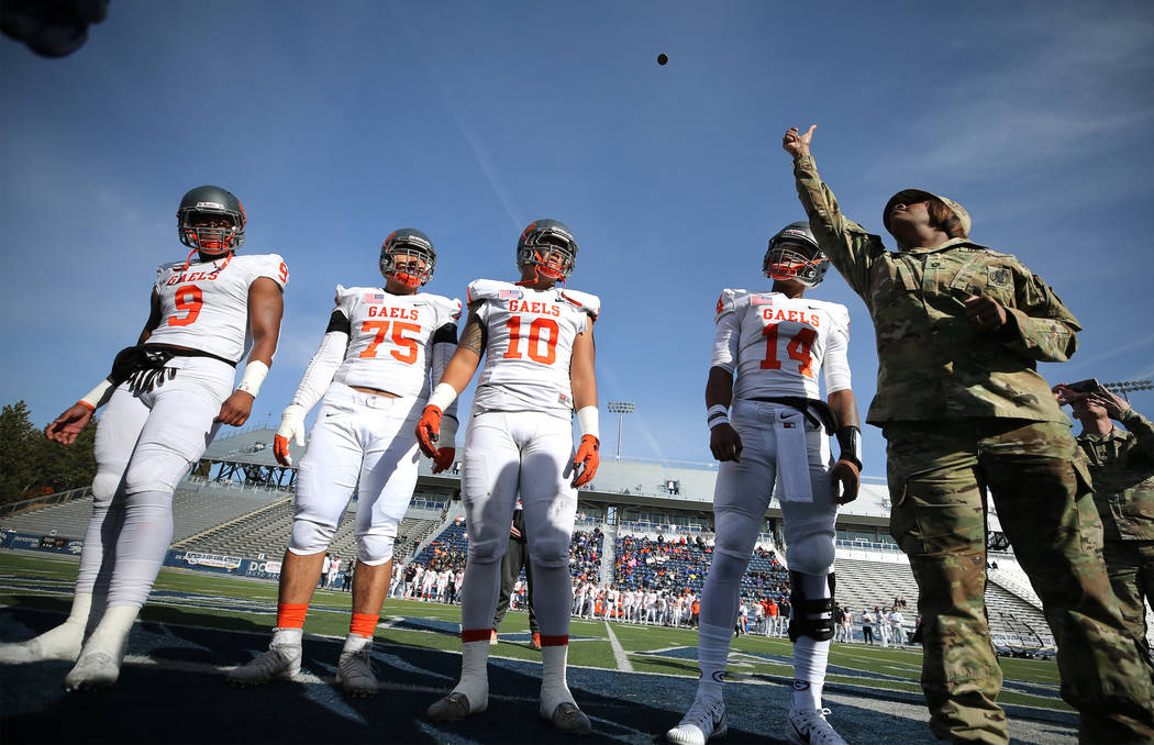 The Bishop Gorman captains call the coin toss at the start of the NIAA 4A state championship football game in Reno, Nev., on Saturday, Dec. 2, 2017. Gorman defeated Reed 48-7. Cathleen Allison/Las ...