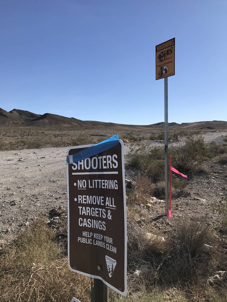 Warning signs stand at the entrance to Southern Nevada's most popular target shooting area on public land off South Las Vegas Boulevard near Sloan, Tuesday, Nov. 28, 2017. Henry Brean Las Vegas Re ...