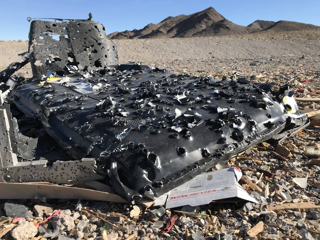 Bullet holes cover a flat-screen television used for target practice at a popular shooting area south of the Las Vegas Valley, Tuesday, Nov. 28, 2017. Henry Brean Las Vegas Review-Journal