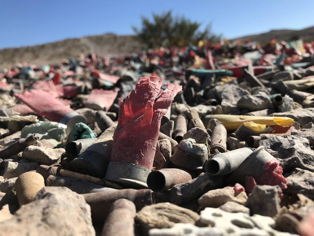 Spent shotgun shells and bullet casings litter the ground, Tuesday, Nov. 27, 2017, in a desert area off South Las Vegas Boulevard that has been trashed by decades of target shooting. Henry Brean L ...